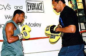 Mosley works the mitts