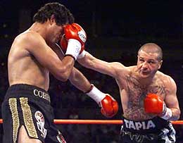 Tapia lands a big right